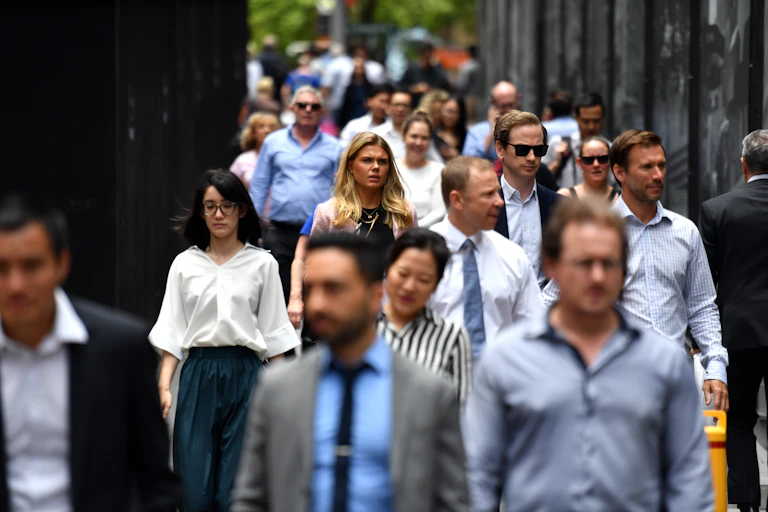 Sydney office workers are seen walking at lunch break
