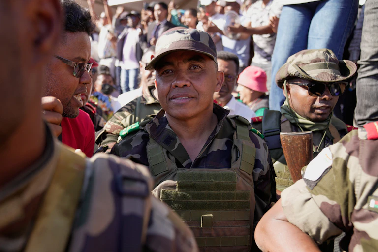 A soldier in a crowd.