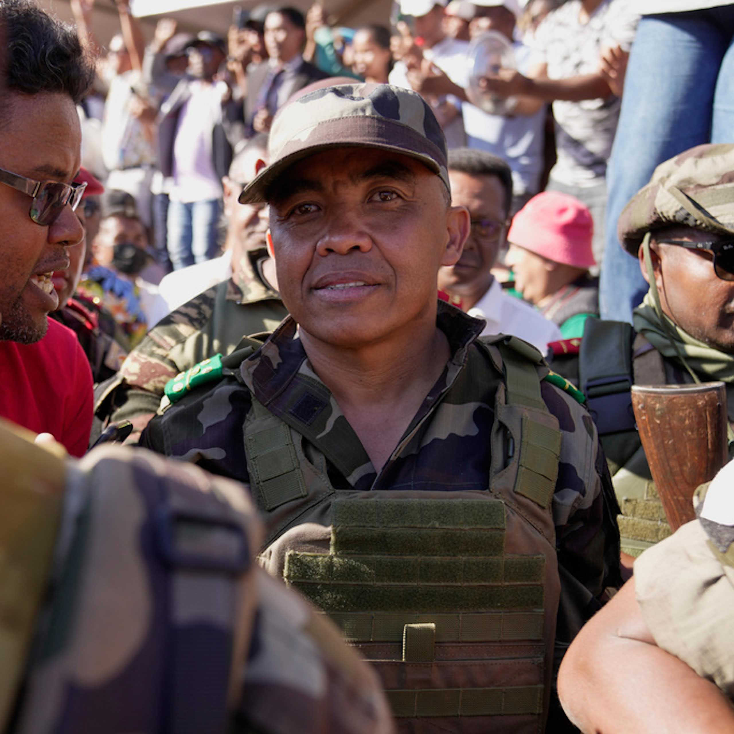 A soldier in a crowd.