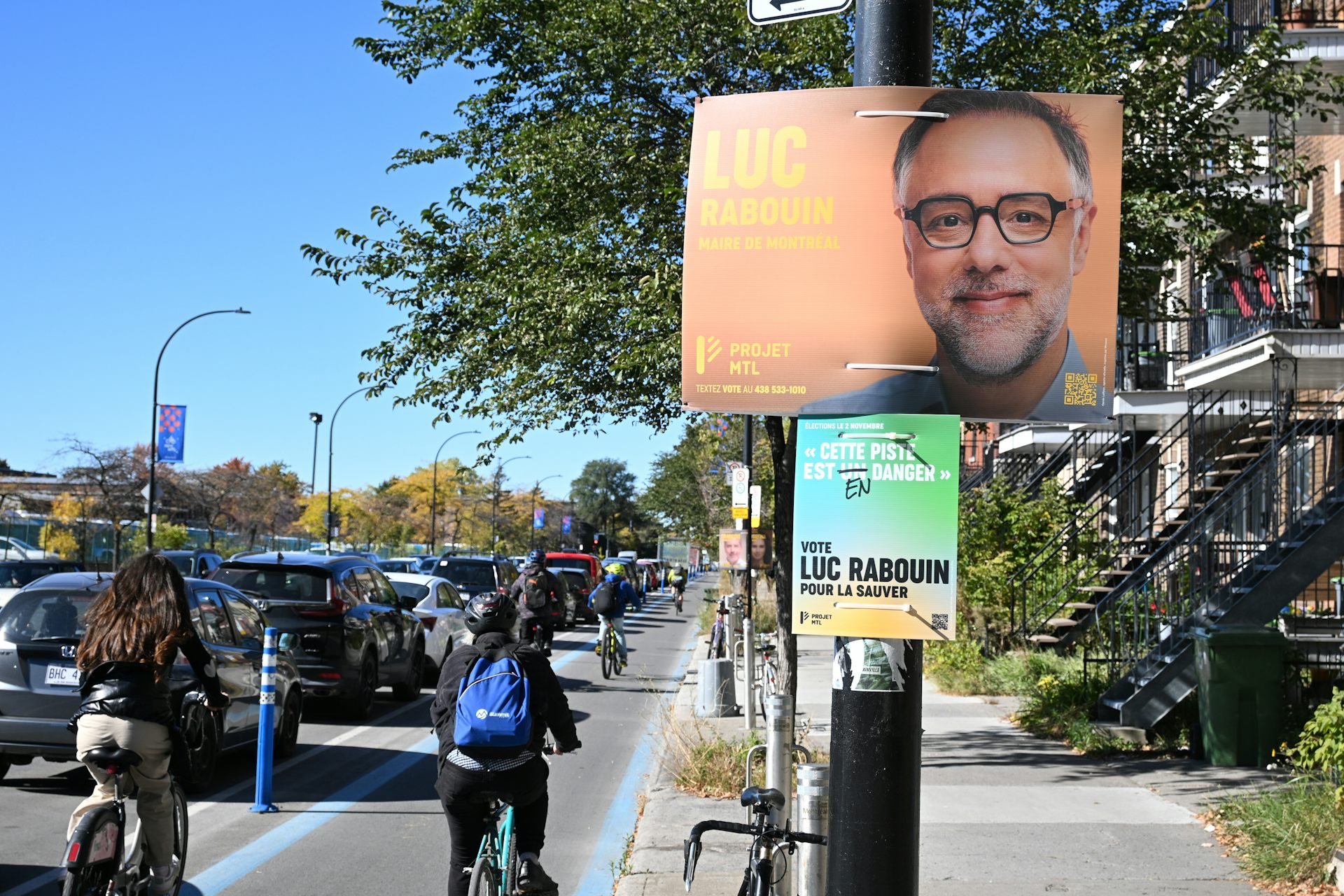 An election poster along a cycling path