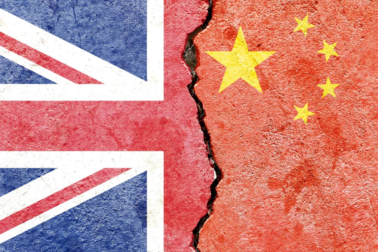 Illustration showing a cracked cement with the UK flag on one side and Chinese flag on the other