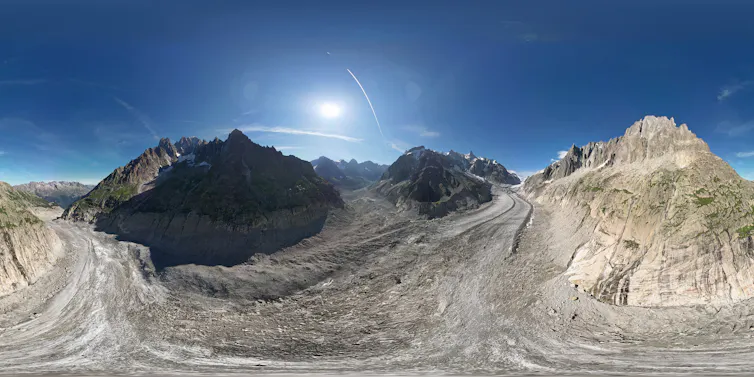 bare mountain range, no snow, blue sky