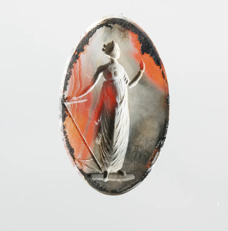 An old intaglio depicts the figure of a woman - Hope personified – with her left hand raised, and an anchor in her right hand.