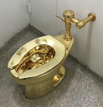 A gold toilet.
