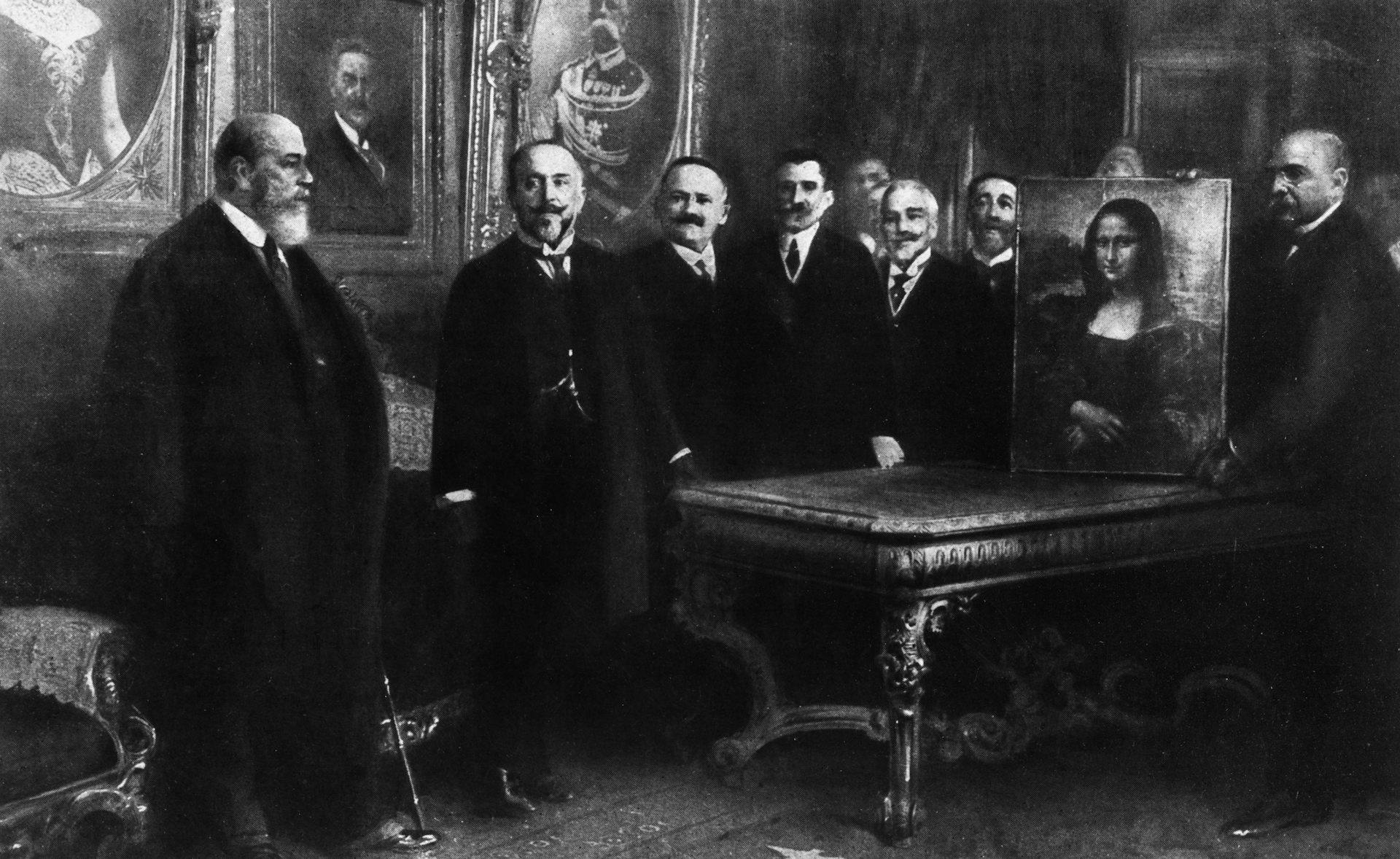 Men stand with the Mona Lisa.