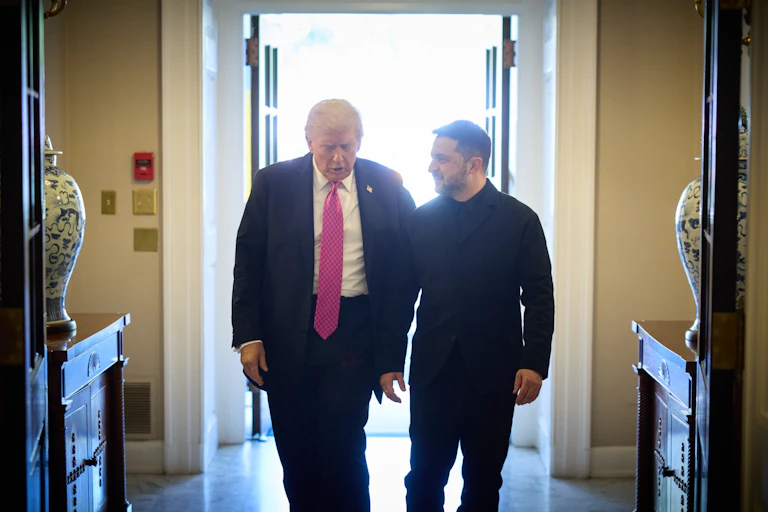 Donald Trump and Volodymyr Zelensky walk into the White House.