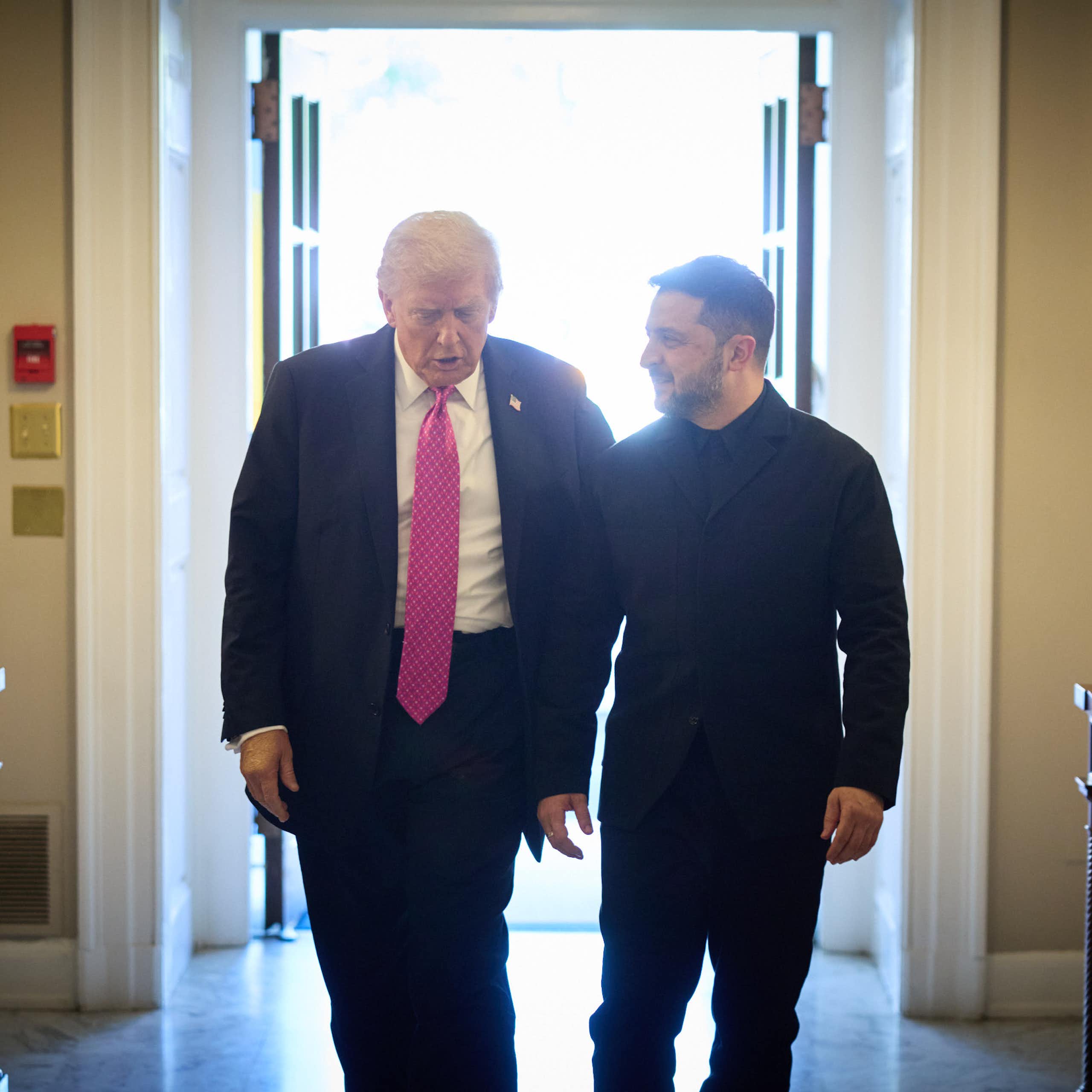 Donald Trump and Volodymyr Zelensky walk into the White House.