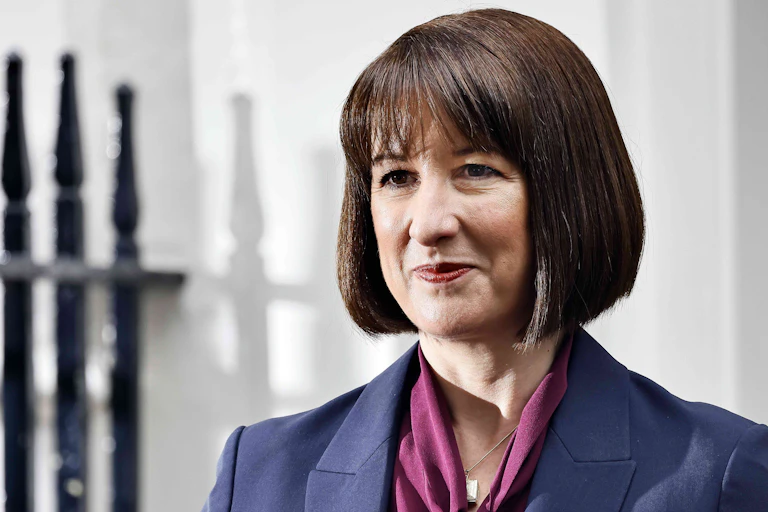 Chancellor Rachel Reeves posing for photographs in Downing Street.