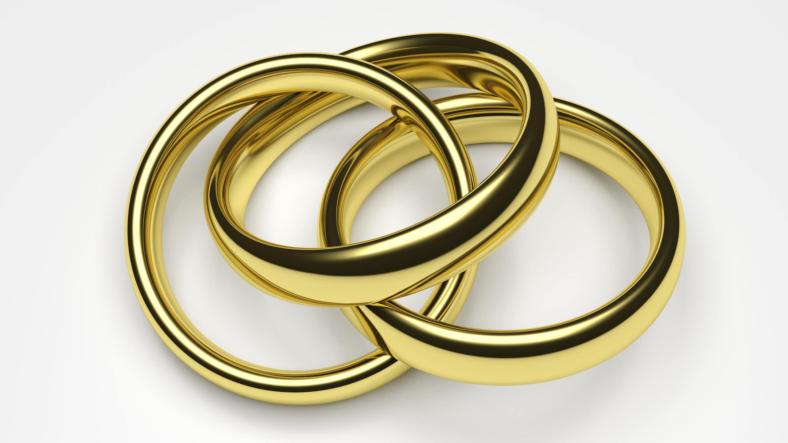 three gold rings intertwined