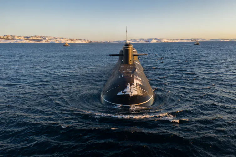 submarine surfacing near the coast