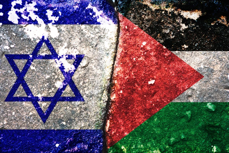 Composaite picture of wartorn Israeli flag next to a wartorn Palestinian flag.