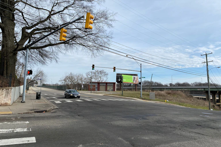 A burial ground surrounded by service roads.