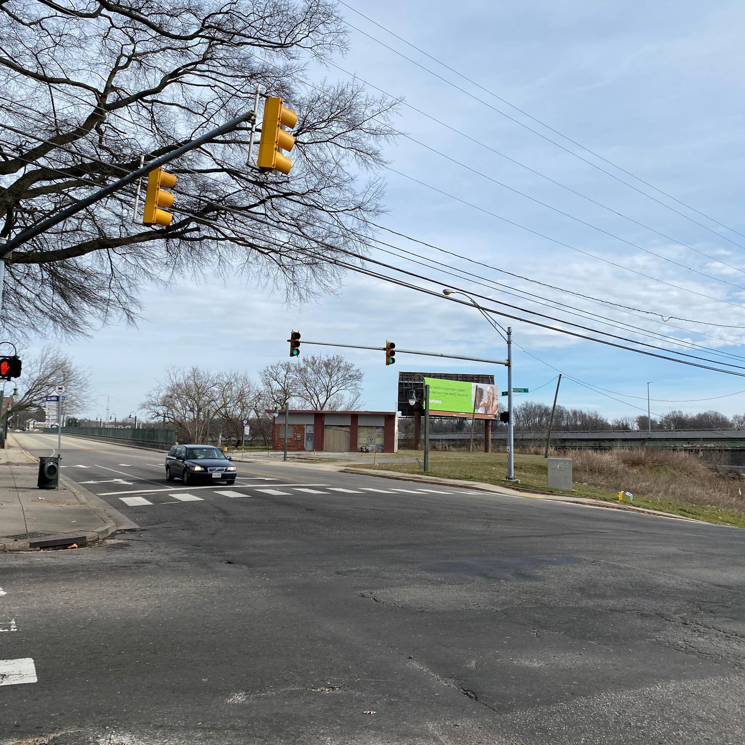 A burial ground surrounded by service roads.