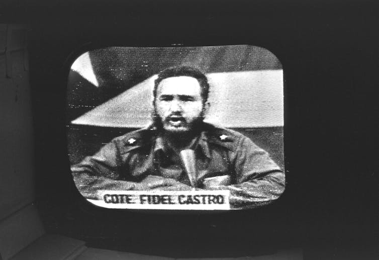 A man appears on an old TV broadcast