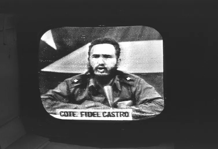 A man appears on an old TV broadcast