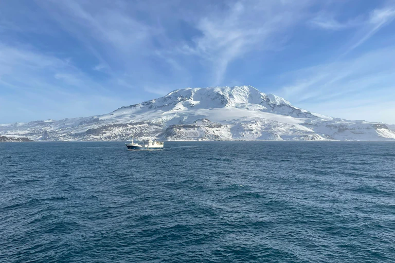 A fishing vessel passing Heard Island.