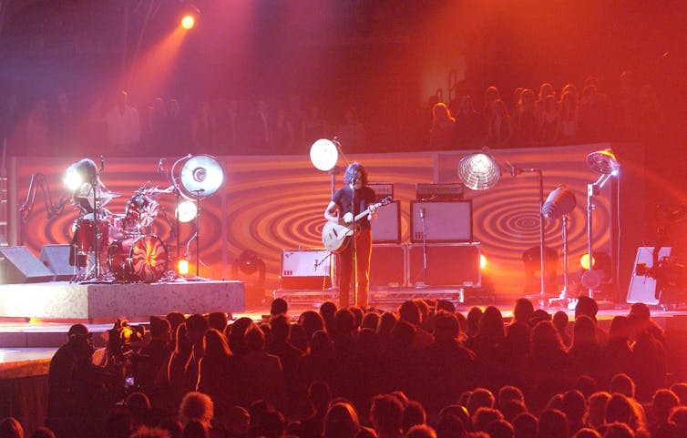 The White Stripes sign up for the Rock & Roll Corridor of Popularity − their primal sound displays Detroit’s commercial roots 1 The band The White Stripes perform at the Grammys.