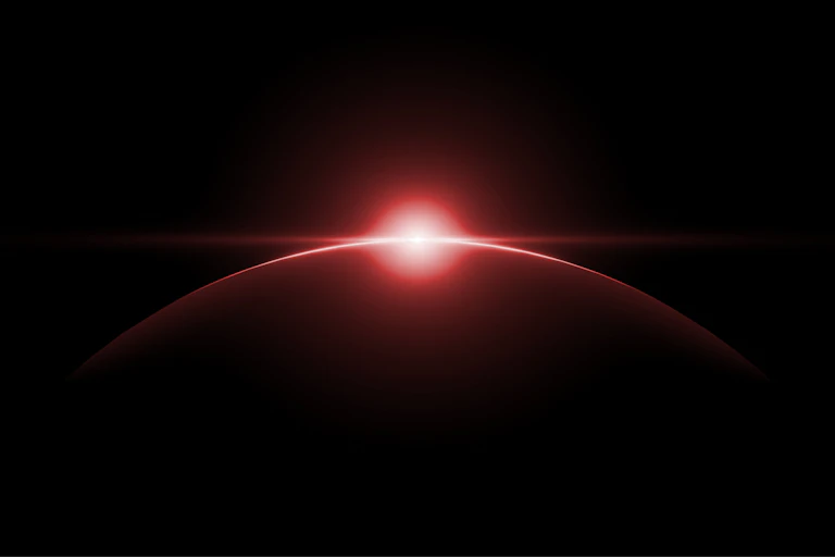 An ominous red light dawns over a dark horizon