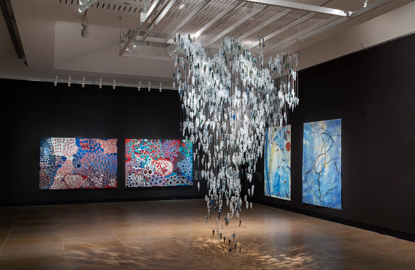 Yhonnie Scarce’s 2,000 suspended glass yams