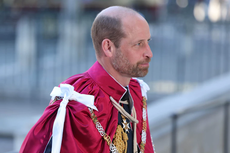 William in a ceremonial red cloak