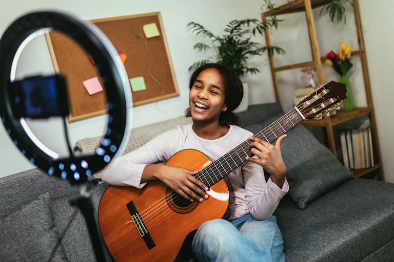 Girl playing guitar