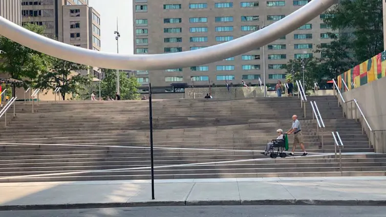a ramp being used by a person in a wheelchair