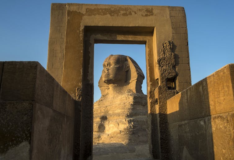 The Sphinx is seen via a gateway.