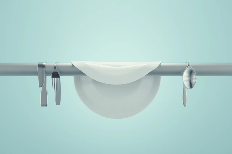 Stylised image of a plate and cutlery drooping over a bar