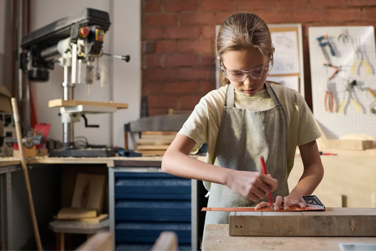 Girl doing woodwork