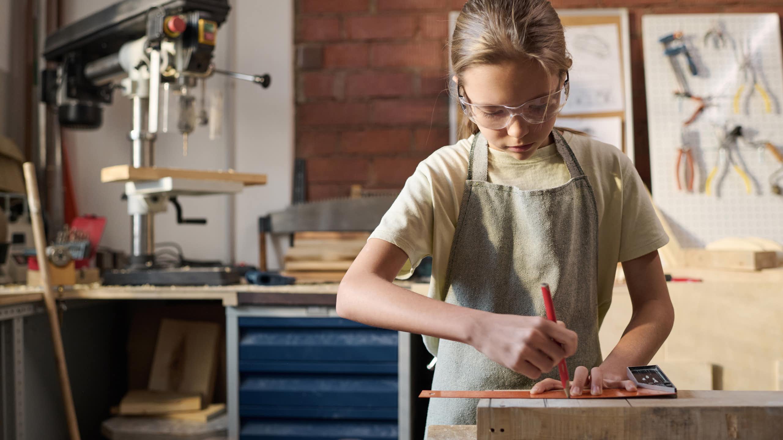 Girl doing woodwork