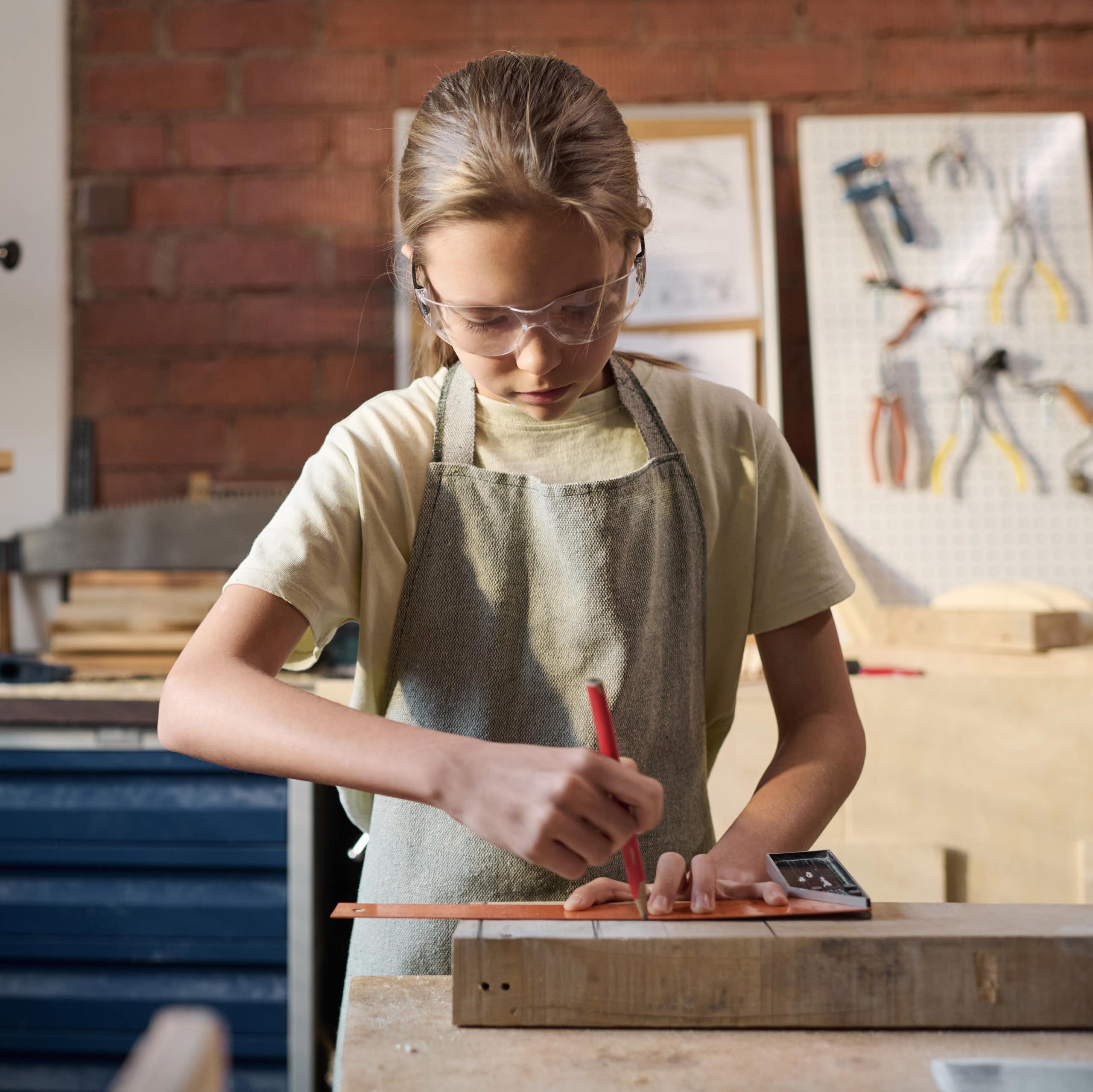 Girl doing woodwork