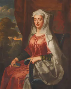 A painting of a medieval woman holidng a book
