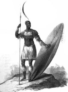 A black and white illustration of a man wearing a breastplate and skirt, holding a large shield and spear.