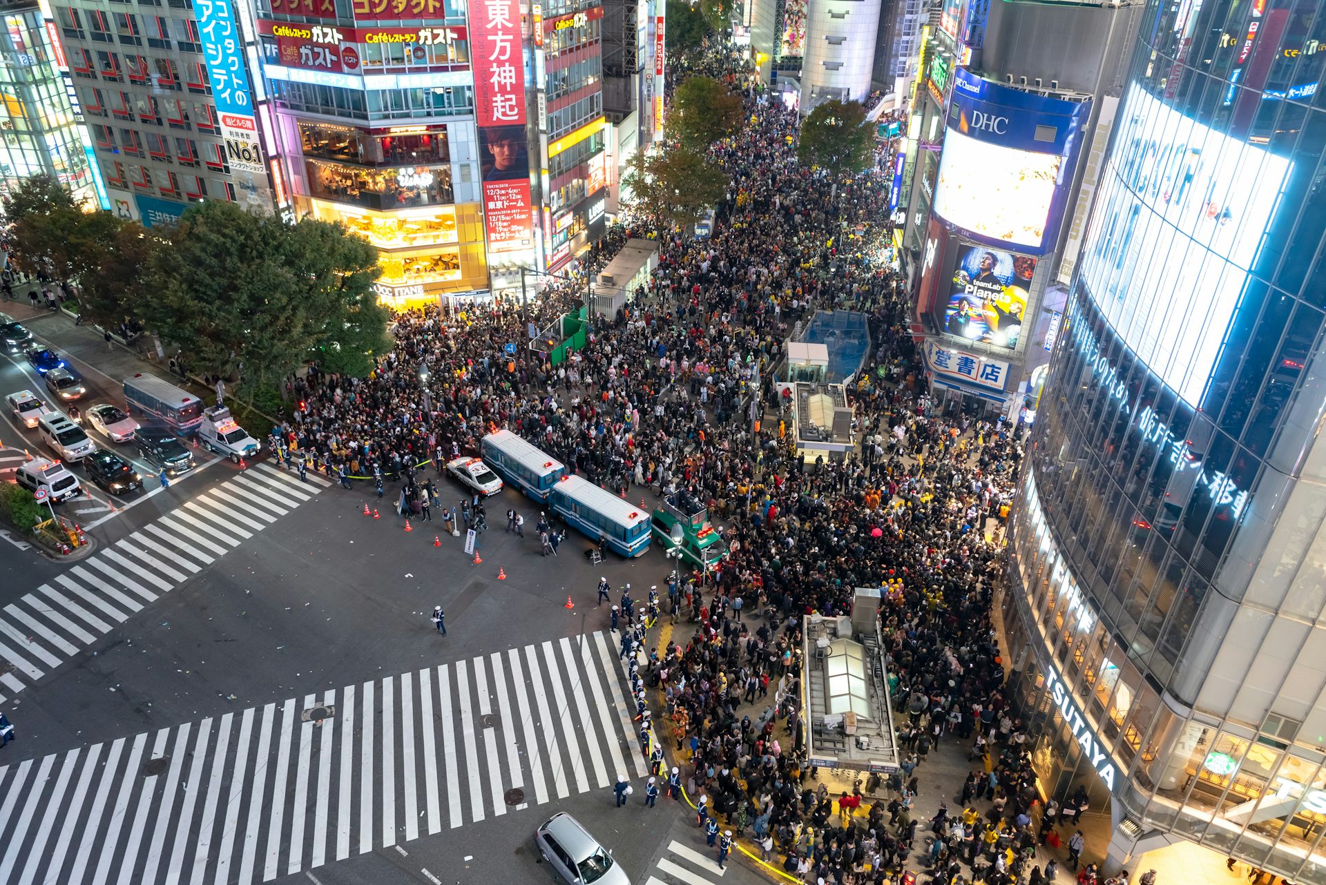A large crowd of people gathered at the Shibuya 'scramble' crossing.