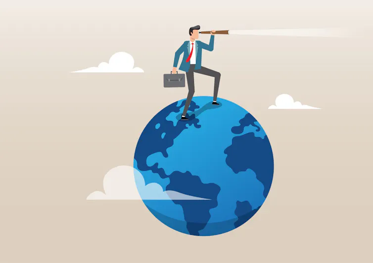 graphic on blue earth, man in suit standing on top looking through telescope