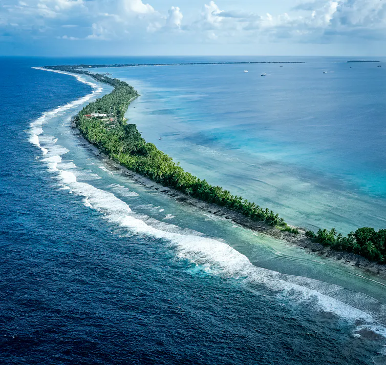 tropical island surrounded by sea