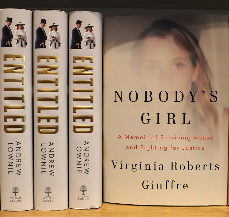 Giuffre's memoir, Nobody's Girl, on display next to a book about Prince Andrew called 'Entitled'