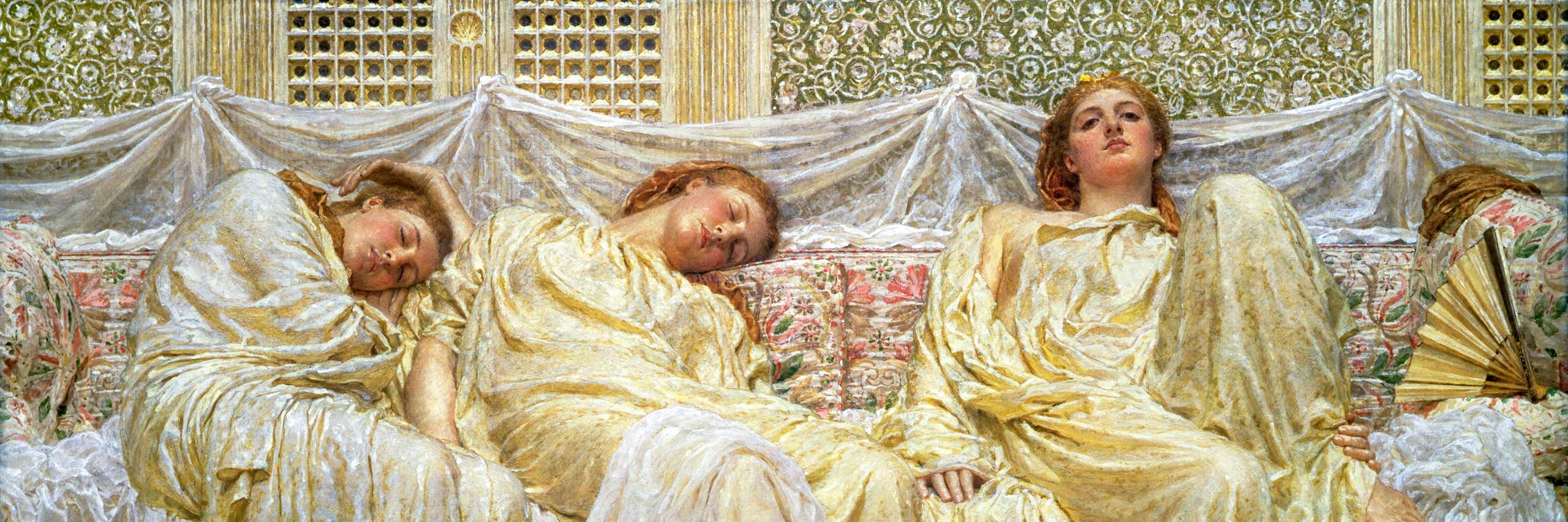 Women asleep on a sofa