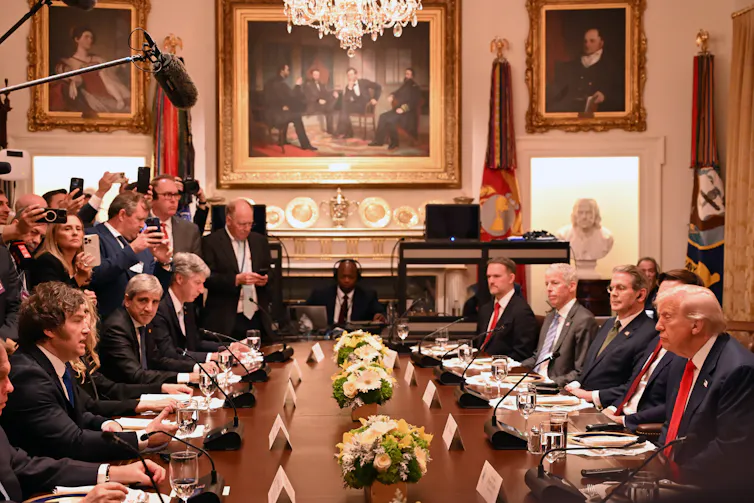 Donald Trump and Javier Milei sat across a table from each other during a White House dinner.