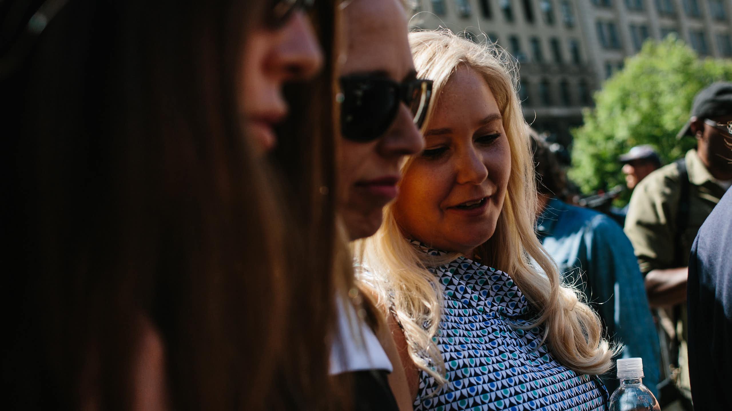 Virginia Giuffre (right) and other survivors of Jeffrey Epstein's abuse after a court hearing in 2019.