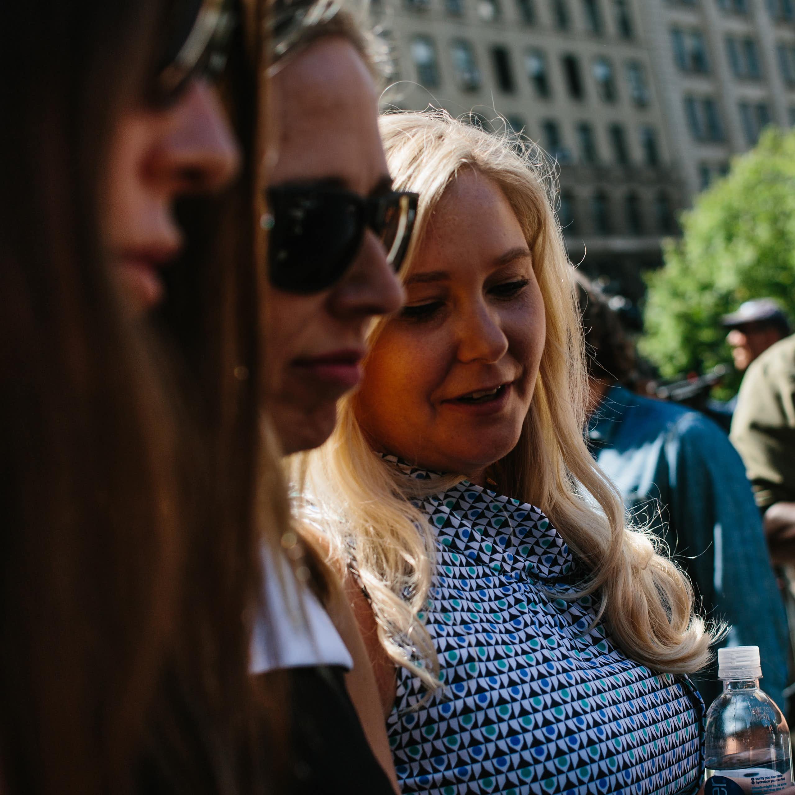 Virginia Giuffre (right) and other survivors of Jeffrey Epstein's abuse after a court hearing in 2019.