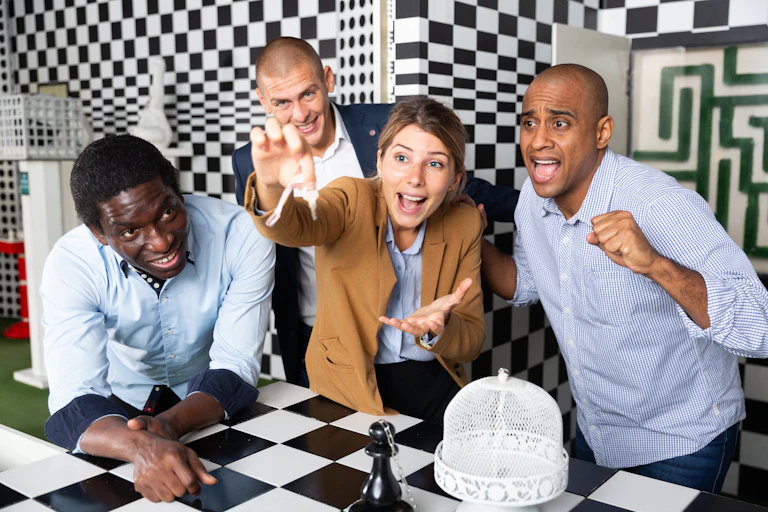 Young adult people trying to solve puzzles to get out of escape room