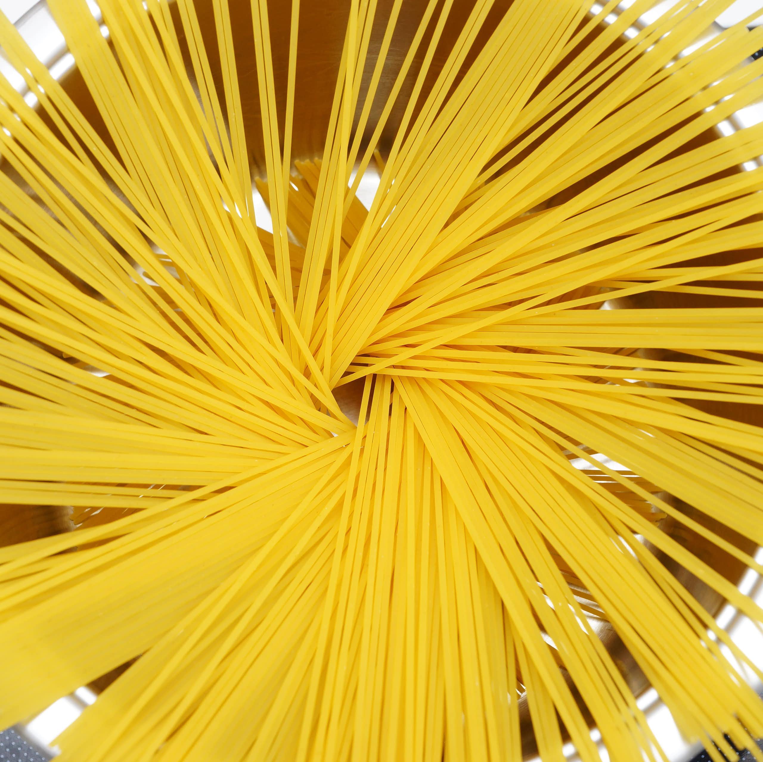 Spaghetti in a cooking pot.