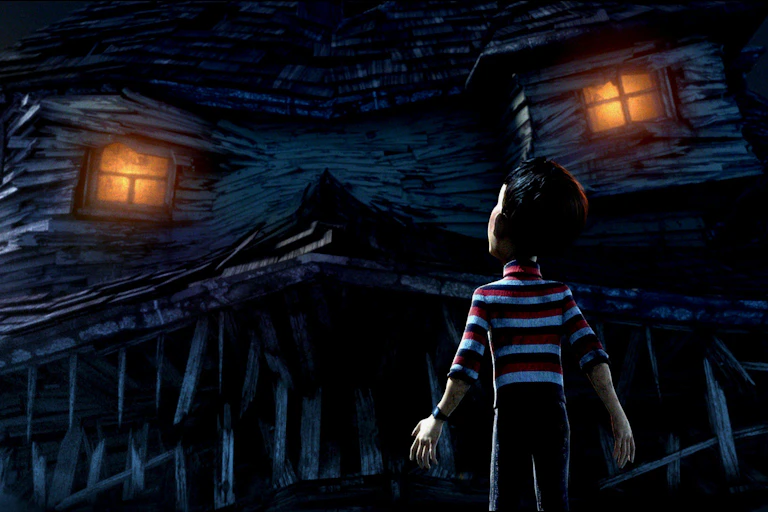 A boy stands in front of a house that has come alive.
