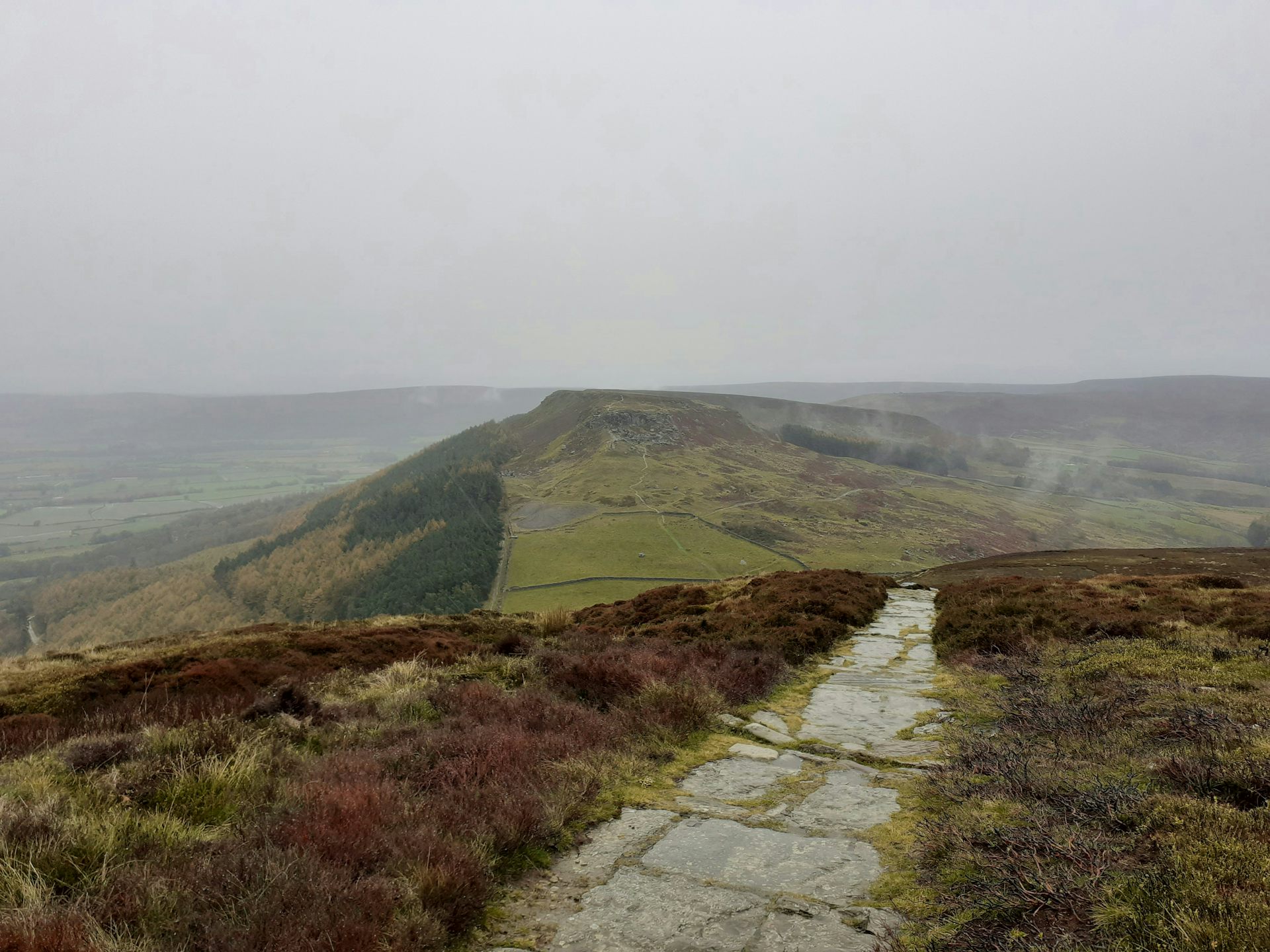 A misty pathway and fell in the background