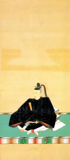 A painting with a large yellow backdrop, showing a man in black robes seated on a green carpet.