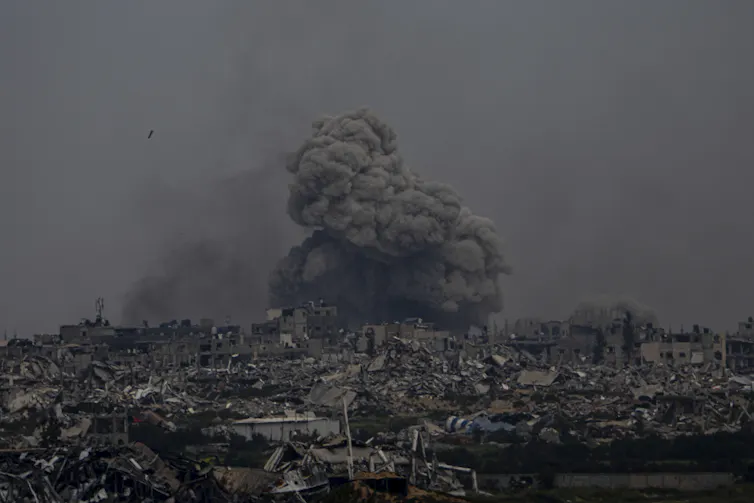 A bomb explodes on a crowded enclave.