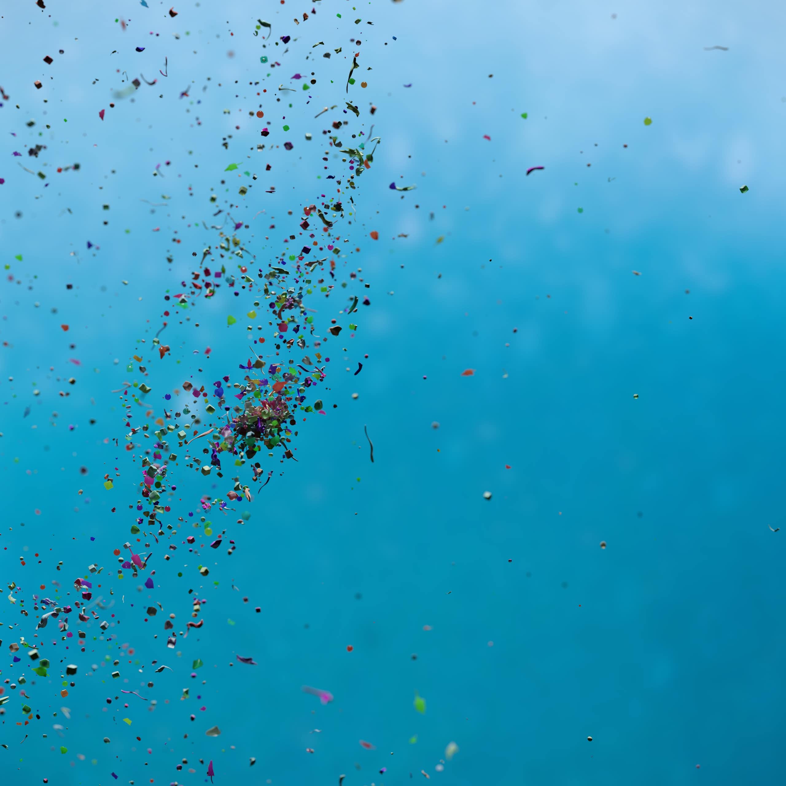 microplásticos flutuando no oceano azul