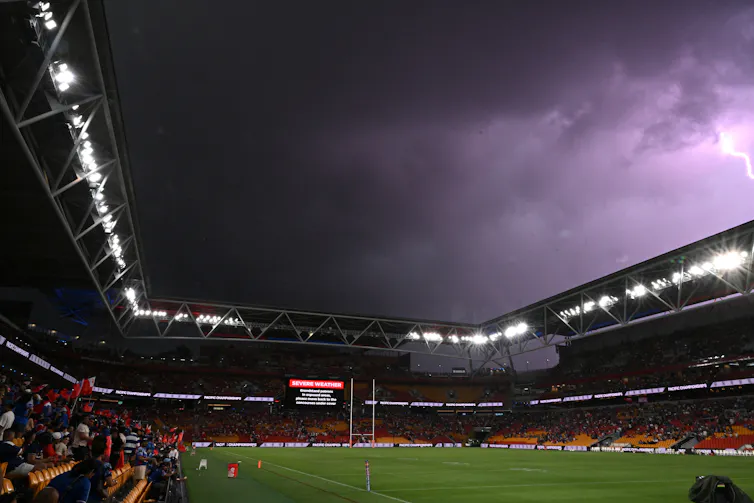 stormy sky above sports stadium.