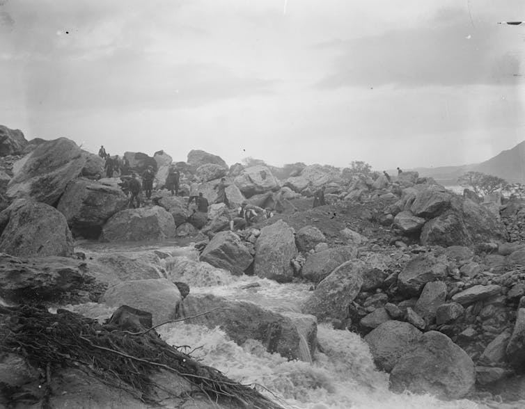 Dam failures of the Twenties made reservoirs more secure – now the local weather disaster is expanding chance once more 1 damaged landscape, black and white pic of boulders